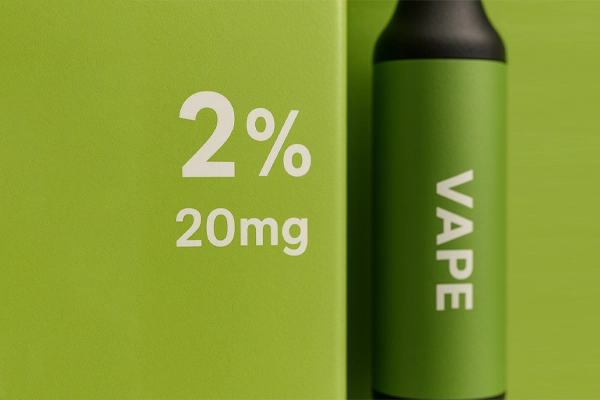 Which Disposable Vapes Do Beginners Really Trust in 2025? 8 Grön vape-produkt med synlig text: "2% 20 mg" och "VAPE" på förpackningen.