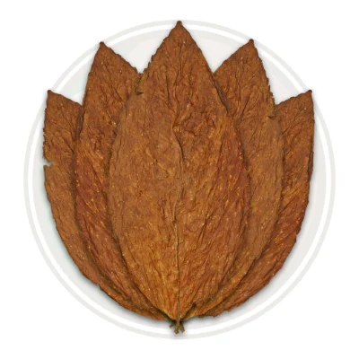 What Are the Most Popular Disposable Vape Flavors in 2026? 12 A set of premium classic tobacco leaves arranged on a white plate, showcasing their rich, brown texture.